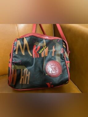 Vintage Falchi Sport Leather Multi-color Crossbody bag with red details.